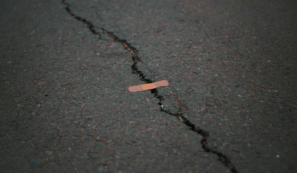 A sticking plaster over a crack in the road.